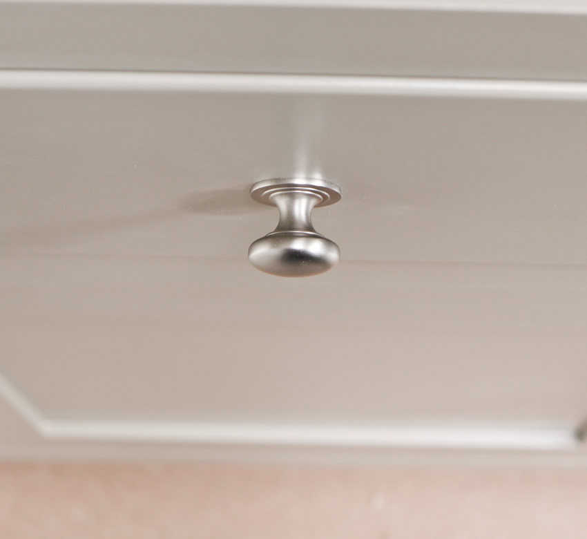 Larder cupboard handpainted in Farrow and Ball Estate Eggshell - Light Gray. Tulip wood carcass construction with birch ply panels and shelves. Oak dovetailed drawers and oak cornice.