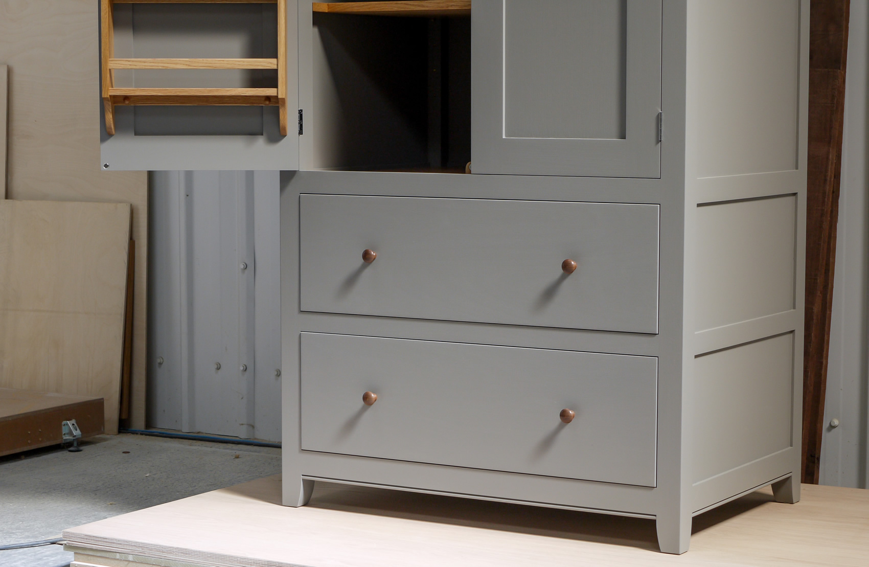Larder cupboard handpainted in Farrow & Ball Estate Egshell - 'Mole's Breath'. Tulip wood carcass with birch ply panels and shelves. Dovetailed oak drawers on high quality soft close runners. Oak spice racks. Solid brass hinges and adjustable brass shelf supports. Solid walnut cornice and knobs. Larder cupboard handpainted in Farrow & Ball Estate Egshell - 'Mole's Breath'. Tulip wood carcass with birch ply panels and shelves. Dovetailed oak drawers on high quality soft close runners. Oak spice racks. Solid brass hinges and adjustable brass shelf supports. Solid walnut cornice and knobs.