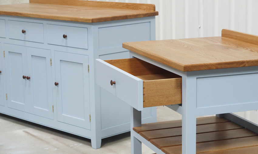 Freestanding slatted shelf unit with oak top and dovetasiled drawer sides and hand turned walnut knob. Hanpainted - Farrow & Ball, 'Lulworth Blue'. Freestanding slatted shelf unit with oak top and dovetasiled drawer sides and hand turned walnut knob. Hanpainted - Farrow & Ball, 'Lulworth Blue'.