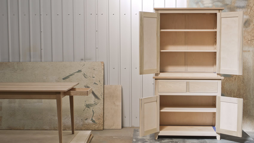 Two part dresser/larder before painting. Tulip wood carcass with birch ply panels and shelves. Oak dovetailed drawers and oak cornice. Hand-turned walnut knobs and pulls to follow..